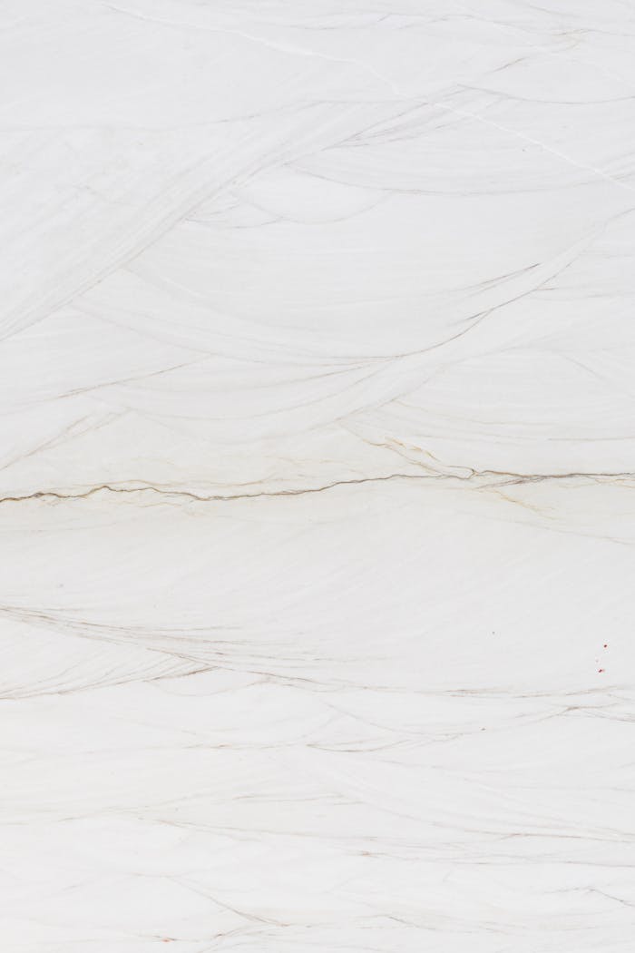 creative-03 White marble texture with subtle veining, perfect for elegant backgrounds.